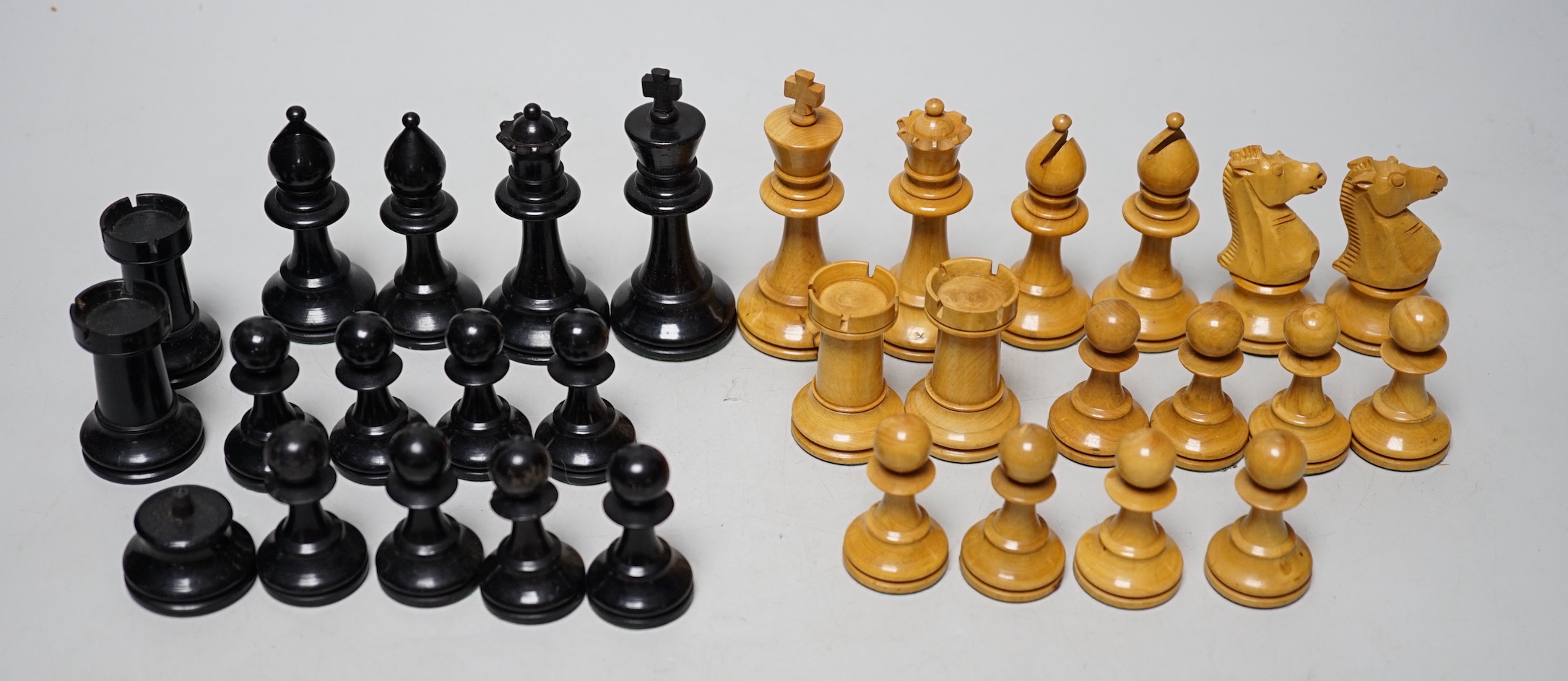 A Staunton pattern lead weighted part boxwood and ebony chess set, kings 8.3cm high (incomplete, lacking both black knights)